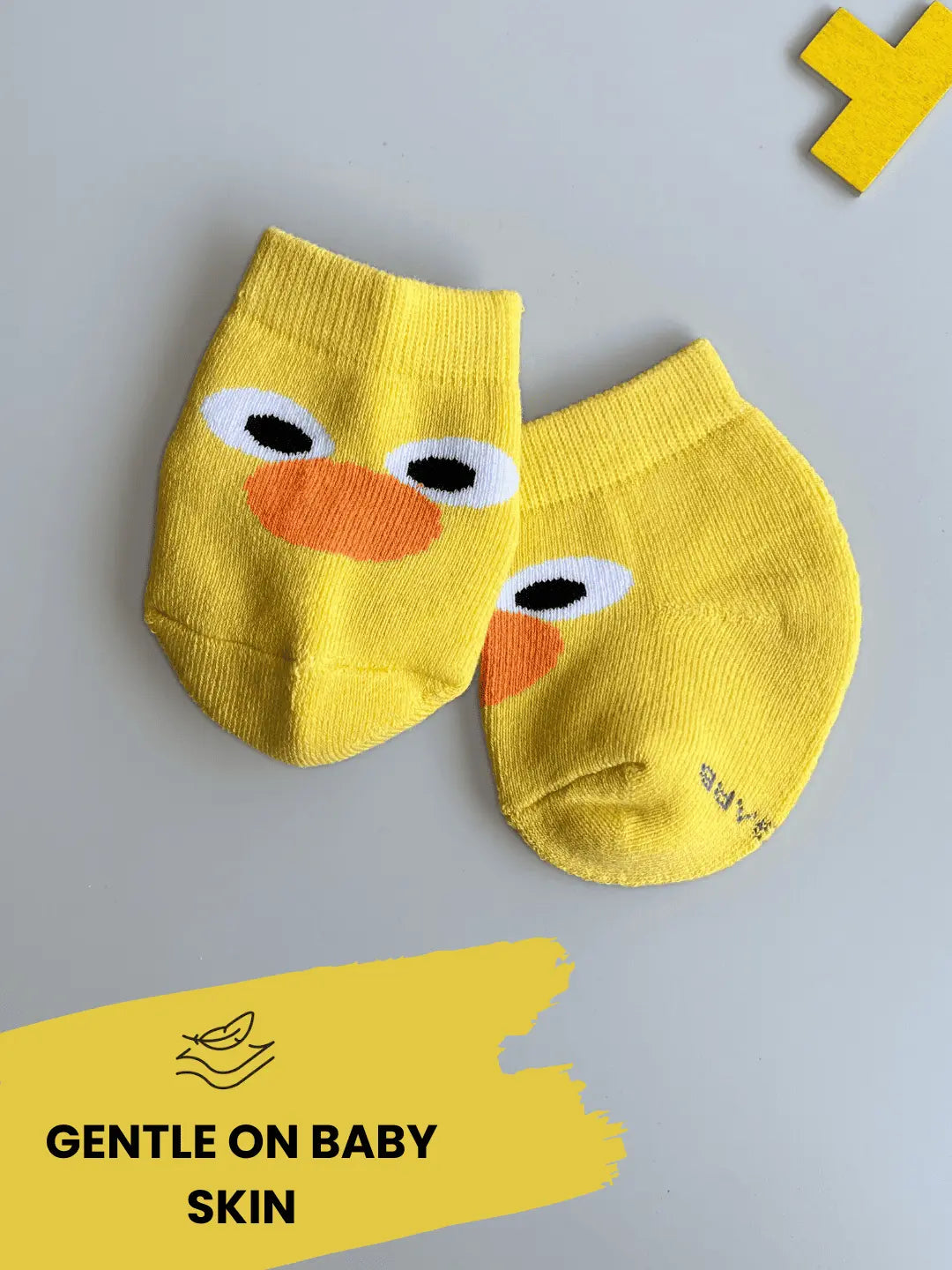 Air Garb brand baby combo socks for infants; a 6-pair set of soft cotton socks featuring pineapple, watermelon, cherry, and cute character face designs in vibrant colors like yellow, red, and blue.