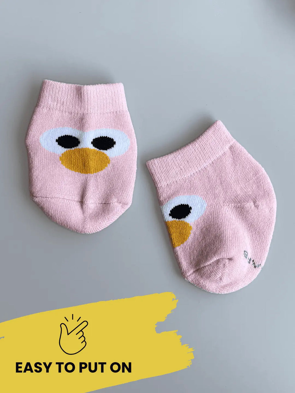 Air Garb brand baby combo socks for infants; a 6-pair set of soft cotton socks featuring pineapple, watermelon, cherry, and cute character face designs in vibrant colors like yellow, red, and blue.